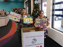 associates collecting for toys for tots